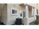 Exterior of home features a covered patio area and an energy-efficient HVAC unit at 1947 Cutlass Dr # 0, Henderson, NV 89014