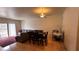 Inviting living and dining area with neutral walls, ceiling fan and lots of natural light at 1947 Cutlass Dr # 0, Henderson, NV 89014
