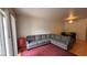 Spacious living room featuring a comfortable sectional sofa and a dining table at 1947 Cutlass Dr # 0, Henderson, NV 89014