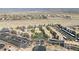 Aerial view of a community featuring well-maintained landscaping, ample parking, and desert surroundings at 2008 Mesquite Ln # 305, Laughlin, NV 89029