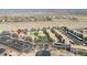Wide aerial view showcasing the community's layout and surrounding desert landscape with ample parking at 2008 Mesquite Ln # 305, Laughlin, NV 89029