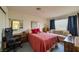 Comfortable bedroom with a large window, soft natural light, and calming color palette at 2008 Mesquite Ln # 305, Laughlin, NV 89029