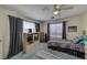 Bedroom view with two beds, a cabinet with entertainment system, and a window at 2008 Mesquite Ln # 305, Laughlin, NV 89029