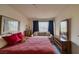 Bedroom features large window with a view, a cozy sofa, and warm, inviting decor at 2008 Mesquite Ln # 305, Laughlin, NV 89029