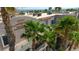 Exterior view of a multi-story condo featuring desert landscaping and architectural details at 2008 Mesquite Ln # 305, Laughlin, NV 89029