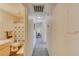 Hallway view leading to a bathroom, showcasing clean lines and neutral tones at 2008 Mesquite Ln # 305, Laughlin, NV 89029