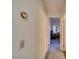 Hallway leading to a study with neutral-colored walls and carpeting at 2008 Mesquite Ln # 305, Laughlin, NV 89029