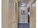 Hallway includes closet with shuttered doors and access to other rooms in the home at 2008 Mesquite Ln # 305, Laughlin, NV 89029
