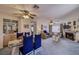 Open-concept living and dining area with a fireplace and modern decor at 2008 Mesquite Ln # 305, Laughlin, NV 89029