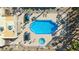 Aerial view of a private backyard oasis with a sparkling pool, spa, and lounging areas at 2008 Mesquite Ln # 305, Laughlin, NV 89029