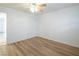 This bedroom has hardwood floors, a ceiling fan and white paint at 204 Orland St # 2, Las Vegas, NV 89107
