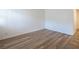Neutral bedroom features wood flooring, white walls, and a large window at 204 Orland St # 2, Las Vegas, NV 89107