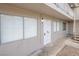 Exterior shot of the apartment building with stairs to upper units and access to unit 2 at 204 Orland St # 2, Las Vegas, NV 89107