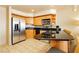 Well-equipped kitchen with stainless steel appliances, ample cabinetry, and black countertops at 211 E Flamingo Rd # 714, Las Vegas, NV 89169