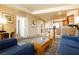 Comfortable living room featuring cozy seating, a modern kitchen, and ample natural light at 211 E Flamingo Rd # 714, Las Vegas, NV 89169