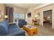 Elegant living area with comfortable seating, a balcony view, and stylish decor at 211 E Flamingo Rd # 714, Las Vegas, NV 89169