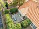 Overhead view of a cozy backyard with a patio, outdoor seating, and lush landscaping at 2292 Cassatt Dr, Henderson, NV 89074