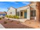 Charming home featuring a well-kept front yard, blue door, and neutral exterior paint at 2292 Cassatt Dr, Henderson, NV 89074