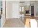 Inviting foyer showcasing tile flooring, coat closet, and a glimpse into the spacious living area at 2292 Cassatt Dr, Henderson, NV 89074