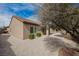 Gravel backyard with covered patio, providing a low-maintenance outdoor living space at 2388 Aztec Ruin Way, Henderson, NV 89044