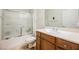 Bathroom featuring a shower with glass doors, a sink, and vanity at 2388 Aztec Ruin Way, Henderson, NV 89044