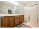 Bathroom featuring a double vanity, and walk in shower at 2388 Aztec Ruin Way, Henderson, NV 89044