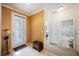 The entryway features a decorative front door and neutral walls at 2388 Aztec Ruin Way, Henderson, NV 89044