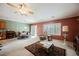 Open-concept space combining living and dining areas with neutral color at 2388 Aztec Ruin Way, Henderson, NV 89044