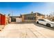 Front view of a well-maintained single-story home with a long driveway at 2540 Eagle St, Las Vegas, NV 89142