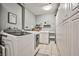 Functional laundry room with ample storage cabinets and modern washer and dryer at 2540 Eagle St, Las Vegas, NV 89142
