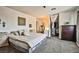 Spacious primary bedroom with neutral decor, plush carpeting, and a walk-in closet area at 2540 Eagle St, Las Vegas, NV 89142