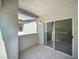 Spacious balcony area with textured walls, tile floor, and sliding glass door entry at 2615 W Gary Ave # 2051, Las Vegas, NV 89123