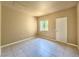 Neutral bedroom featuring a large window and tile flooring at 2615 W Gary Ave # 2051, Las Vegas, NV 89123