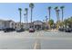 Community clubhouse and pool with mature landscaping and parking at 2615 W Gary Ave # 2051, Las Vegas, NV 89123