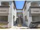 Exterior shot of a multi-story apartment complex with staircases and open-air walkways at 2615 W Gary Ave # 2051, Las Vegas, NV 89123
