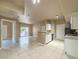 Bright living room with sliding doors, kitchen, and tile flooring at 2615 W Gary Ave # 2051, Las Vegas, NV 89123