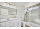 Bathroom featuring a tiled shower and vanity with marble counters at 3009 Anna Bay Dr, Las Vegas, NV 89134