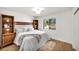 Comfortable bedroom featuring built-in shelving, natural light, and sleek modern design at 3009 Anna Bay Dr, Las Vegas, NV 89134
