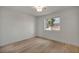 Bedroom featuring light-colored hardwood floors and bright window at 3009 Anna Bay Dr, Las Vegas, NV 89134