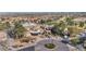Stunning overhead shot of the community clubhouse, showing the manicured landscape and roundabout at 3009 Anna Bay Dr, Las Vegas, NV 89134