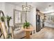 Inviting dining area with built-in seating and a modern stainless steel refrigerator at 3009 Anna Bay Dr, Las Vegas, NV 89134
