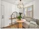 Inviting dining area featuring built-in bench seating and a modern light fixture at 3009 Anna Bay Dr, Las Vegas, NV 89134