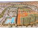 Aerial view of the community, baseball fields, swimming pool, and landscaping at 3096 Beaux Art Ave, Henderson, NV 89044