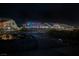 View of the yard with a patio covered in multi-colored festive lighting at 3096 Beaux Art Ave, Henderson, NV 89044