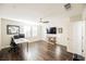 Bedroom with wood-look flooring, ceiling fan, shutters on the window, and nice furniture at 3096 Beaux Art Ave, Henderson, NV 89044