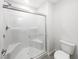 Bathroom featuring a glass shower and a standard white toilet at 3610 Tripoli Cove Ave, Las Vegas, NV 89106