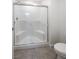Modern bathroom featuring a sleek, glass-enclosed shower with built-in seating at 3610 Tripoli Cove Ave, Las Vegas, NV 89106