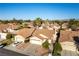 Aerial neighborhood shot of well-kept homes, lush landscaping, and inviting curb appeal at 364 Rushing Creek Ct, Henderson, NV 89014