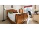 Cozy bedroom featuring a wooden bed frame and desk space at 364 Rushing Creek Ct, Henderson, NV 89014