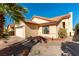 Stylish single-story home with desert landscaping, a two-car garage, and a covered entrance at 364 Rushing Creek Ct, Henderson, NV 89014